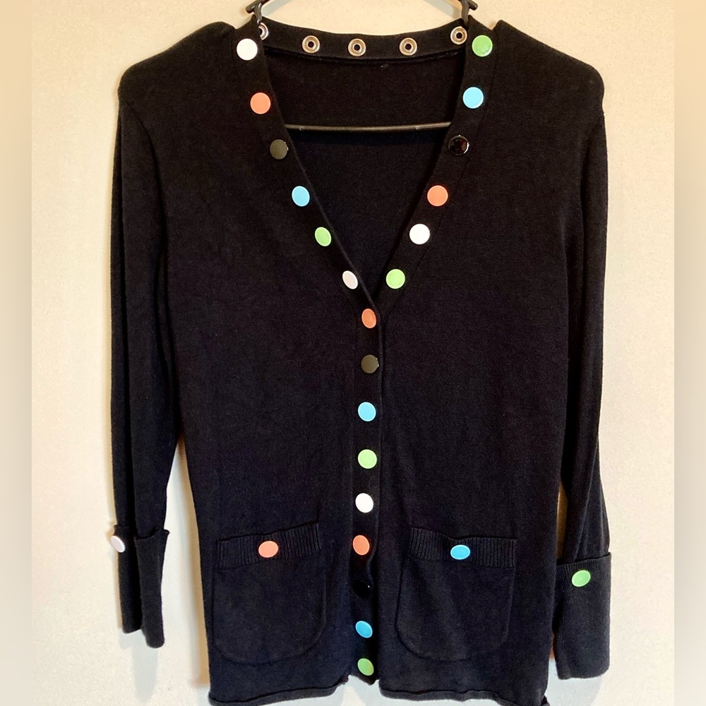 One Girl Who stylish black cardigan with various colored snaps